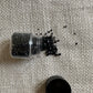 Black Granules Small Bottle