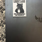 Sticker on a laptop with text 'I don't like morning people or morning people or morning people' on a decorative surface.