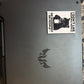Laptop with a sticker on the back